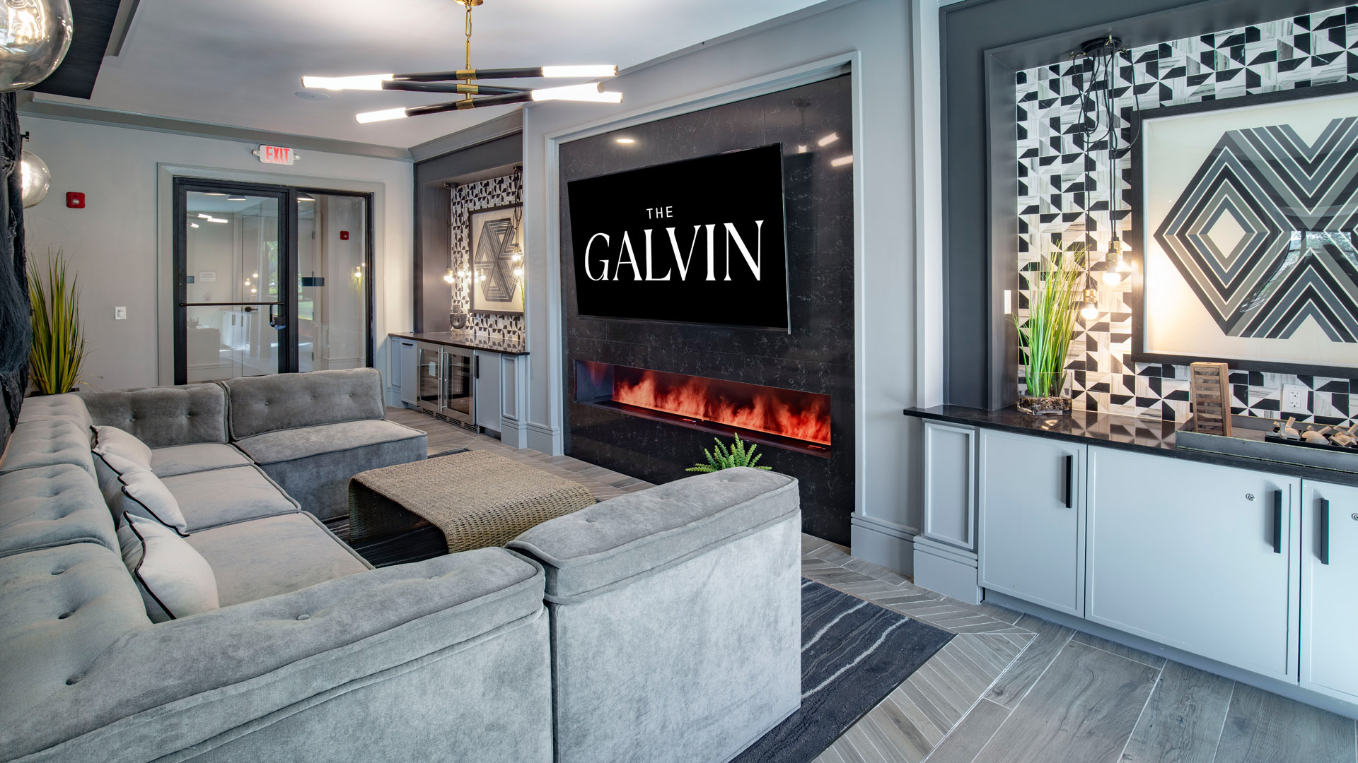 Modern lounge with fireplace and TV