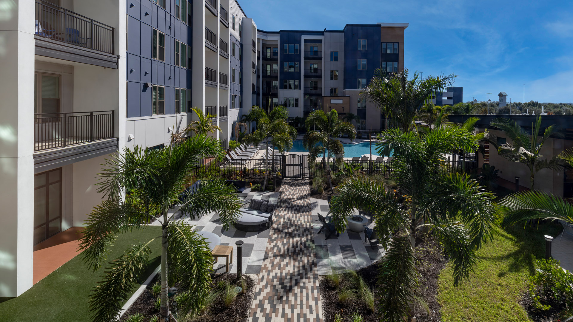 Modern apartment complex with pool area