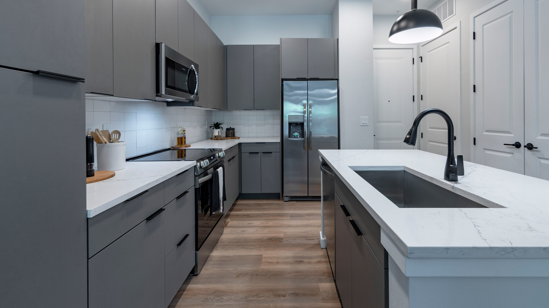 Modern kitchen with sleek gray cabinets