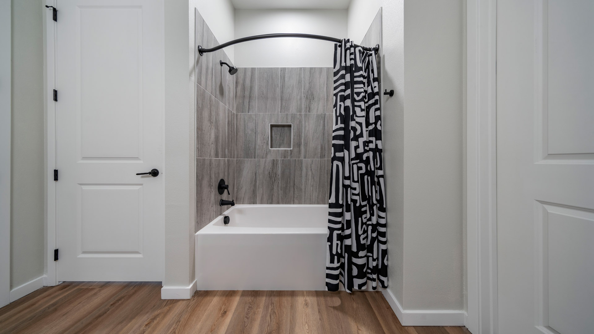 Modern bathroom with stylish shower curtain