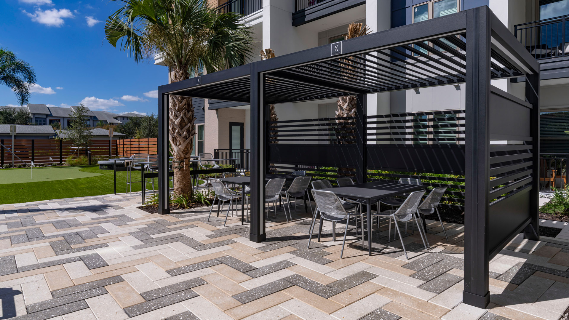 Modern outdoor dining area with shade